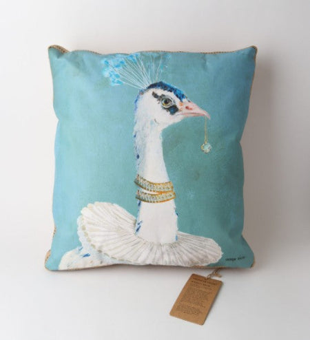 Decorative pillow with a peacock design on a light blue background